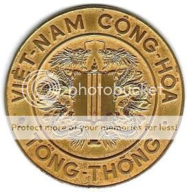  photo On the presidential seal the achievement is surrounded by the legend VIET-NAM CONG-HOA TONG-THOcircNG. The achievement was used 1963-1975..jpg